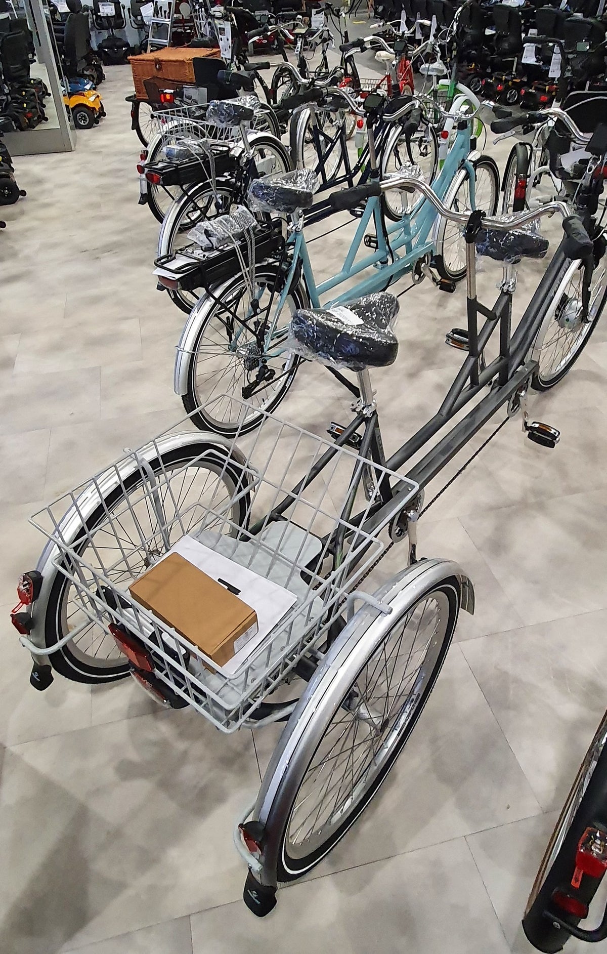 Driewielfietsen en tandems.